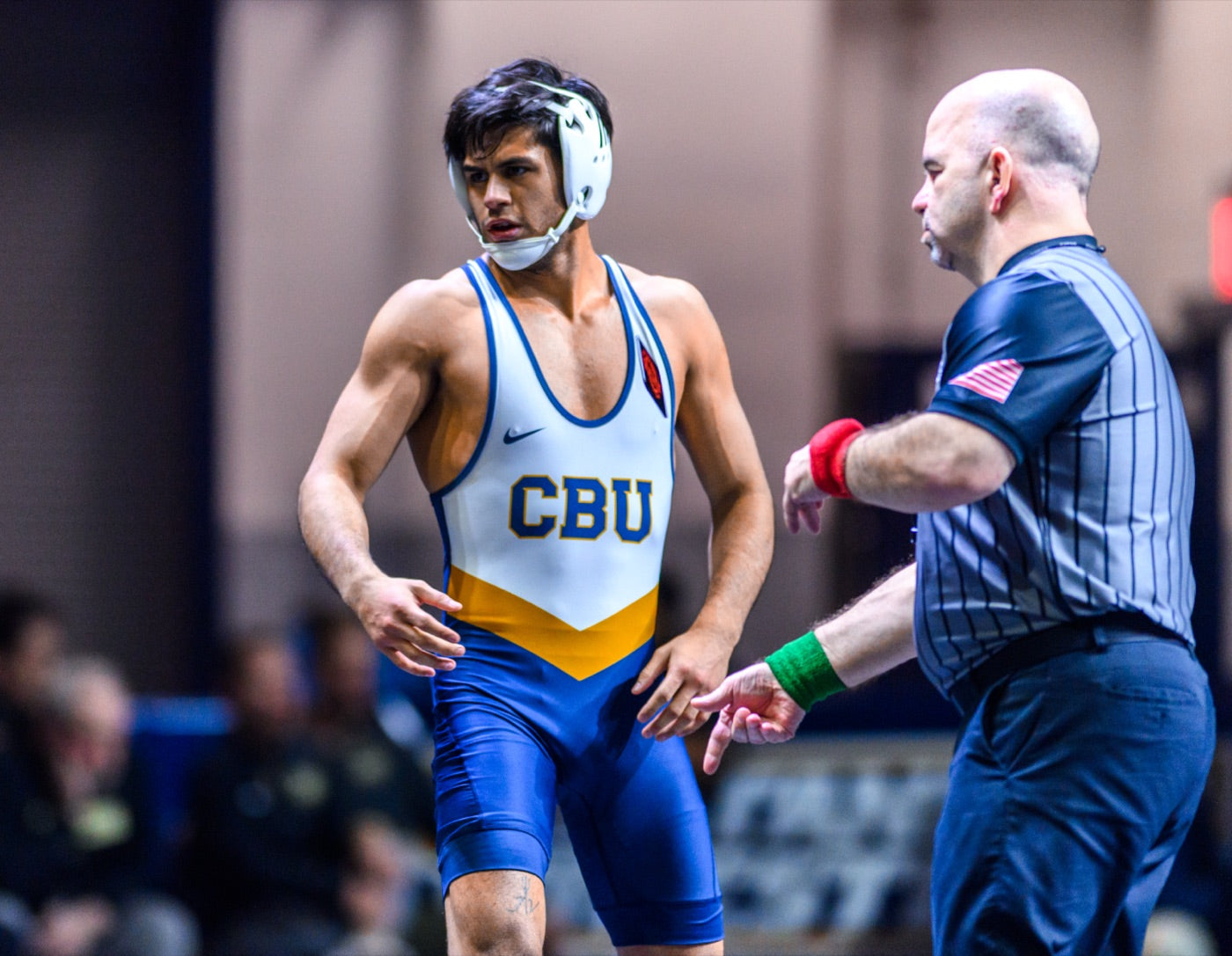 Jesse Vasquez in the CBU singlet and white headgear